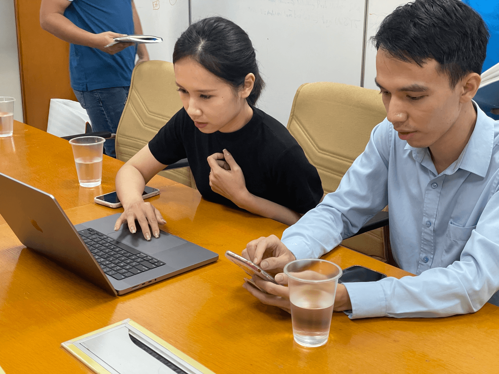 Bank staff testing the initial designs