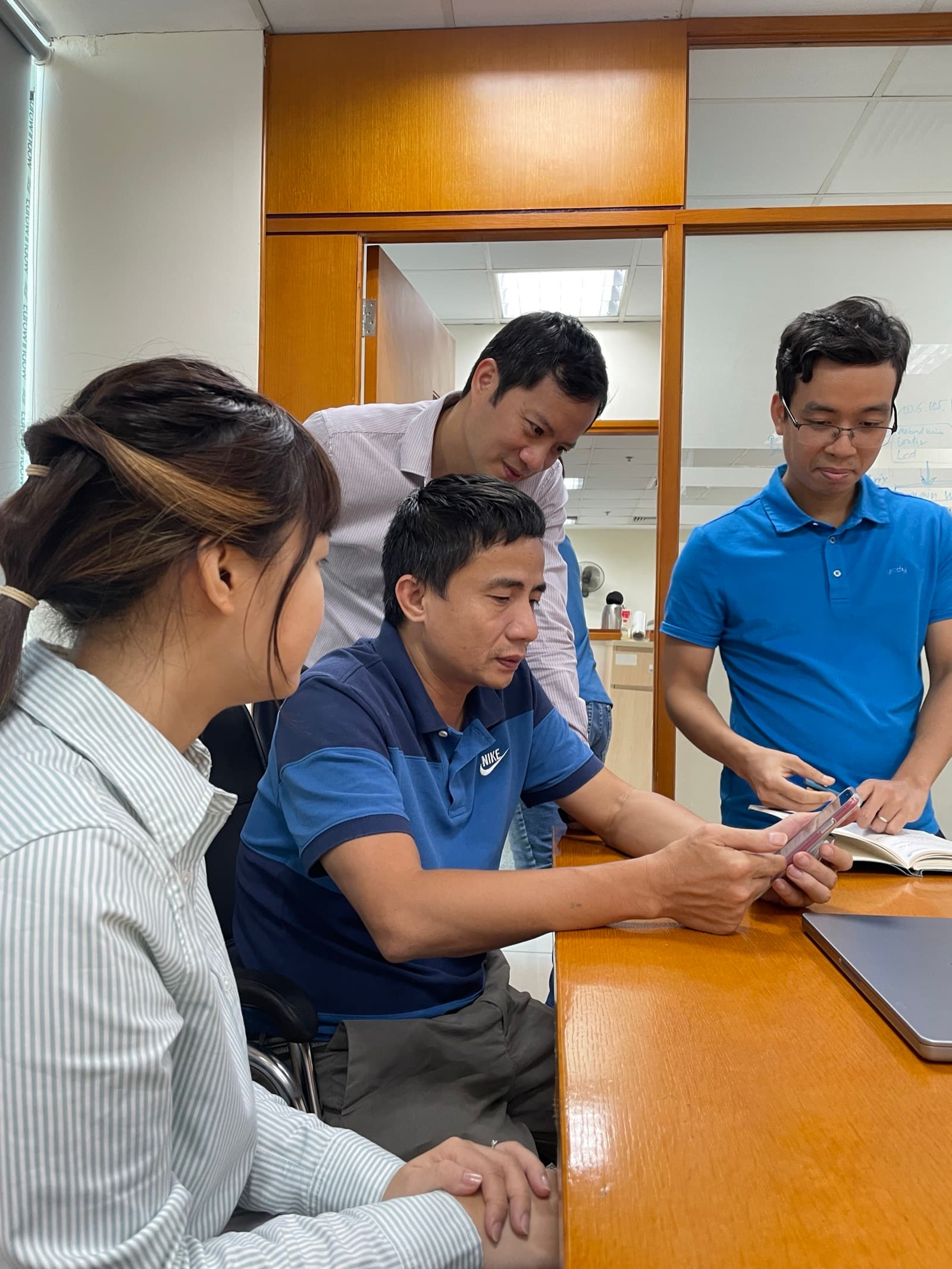 Testing initial designs with bank staff at a table